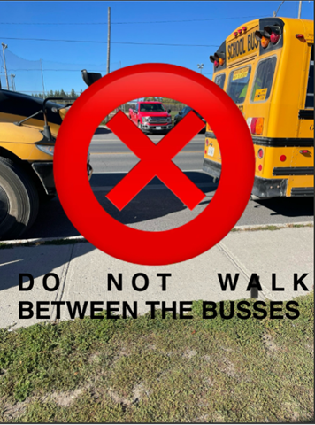 Do not walk between the buses